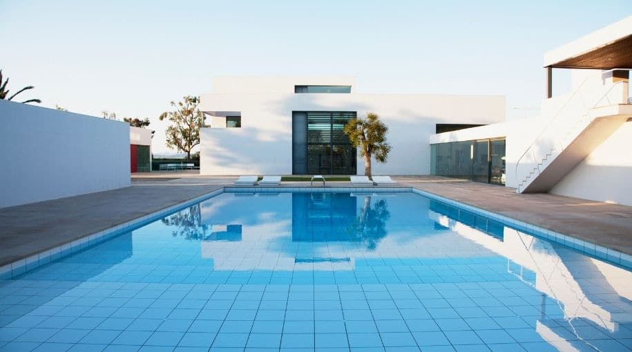 A beautiful, modern, pool using one of the Ways To Heat A Pool