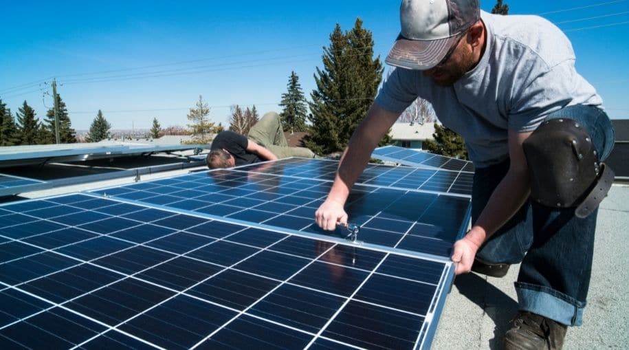 two men installing efficient solar panels