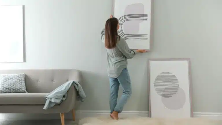 woman hanging wall art